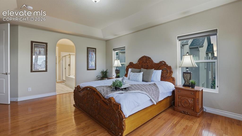 Image 29 of 50: The Primary Bedroom has an adjoining 5-piece bathroom.