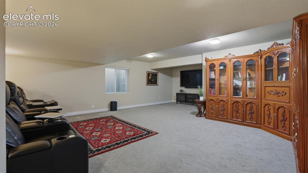 Image 38 of 50: Huge Basement Family/Rec Room with media area.