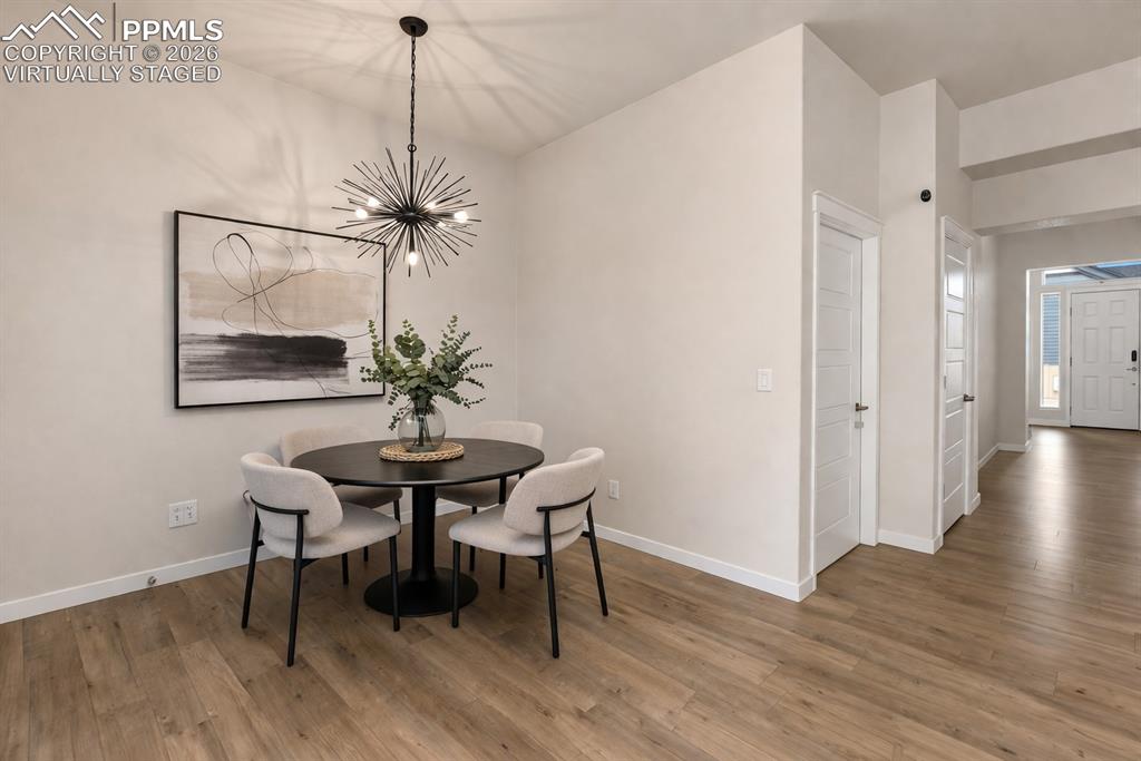 Image 16 of 46: Bright nook with cozy morning vibes (virtually staged)