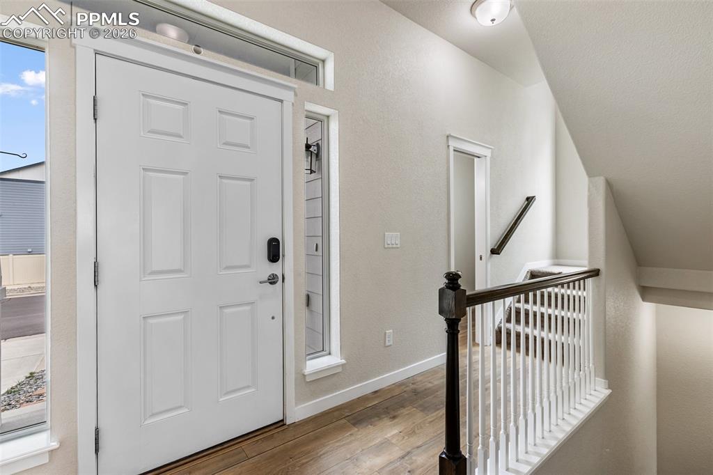 Image 19 of 46: Welcoming entry with clean, modern feel