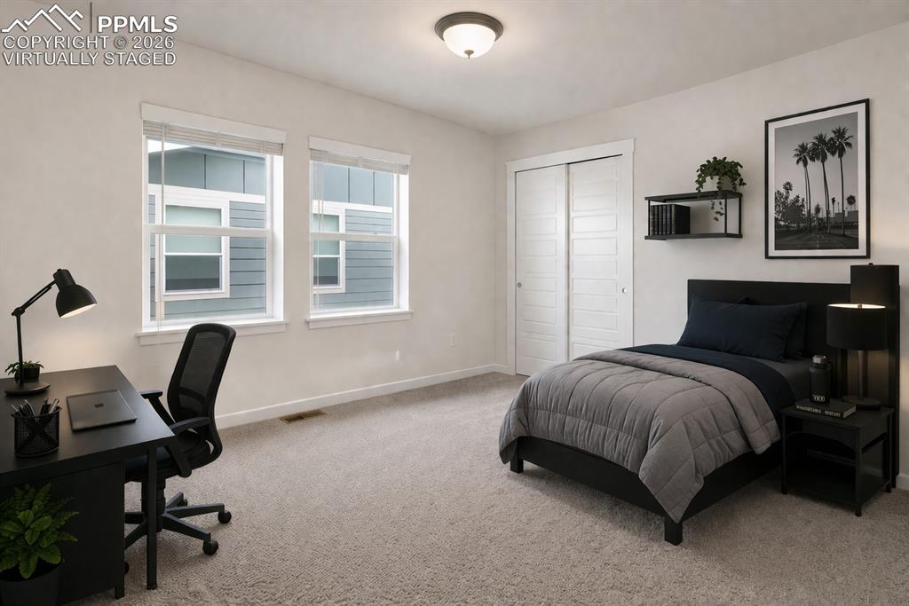 Image 22 of 46: Comfortable bedroom with great natural light (virtually staged)