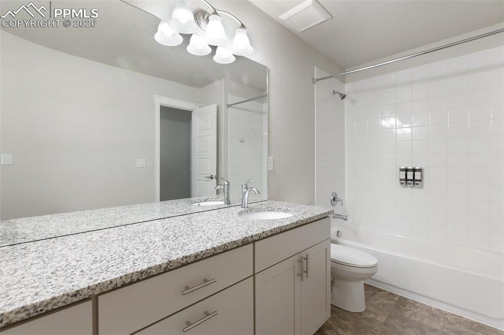 Image 23 of 46: Clean bathroom with bright, fresh feel