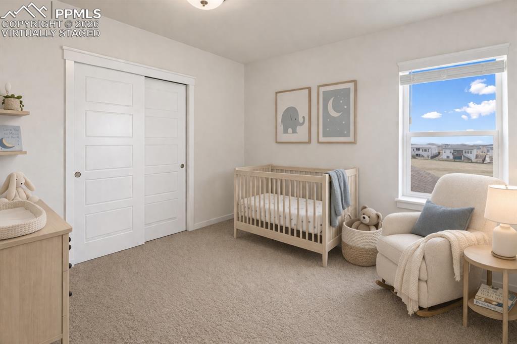 Image 25 of 46: Well-sized bedroom with abundant light (virtually staged)