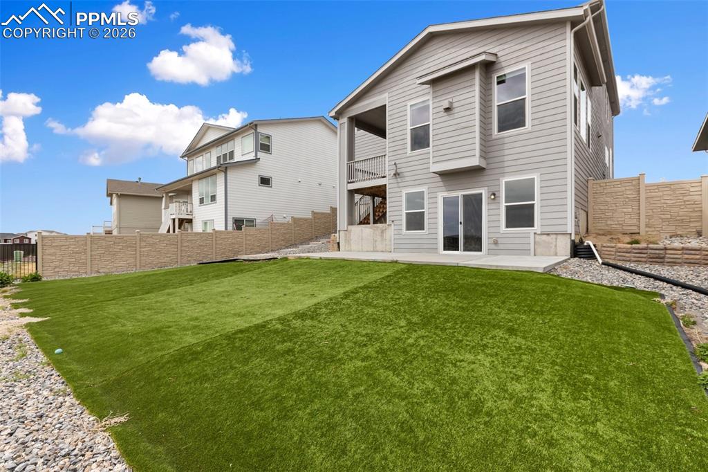 Image 34 of 46: Backyard-facing exterior with great presence