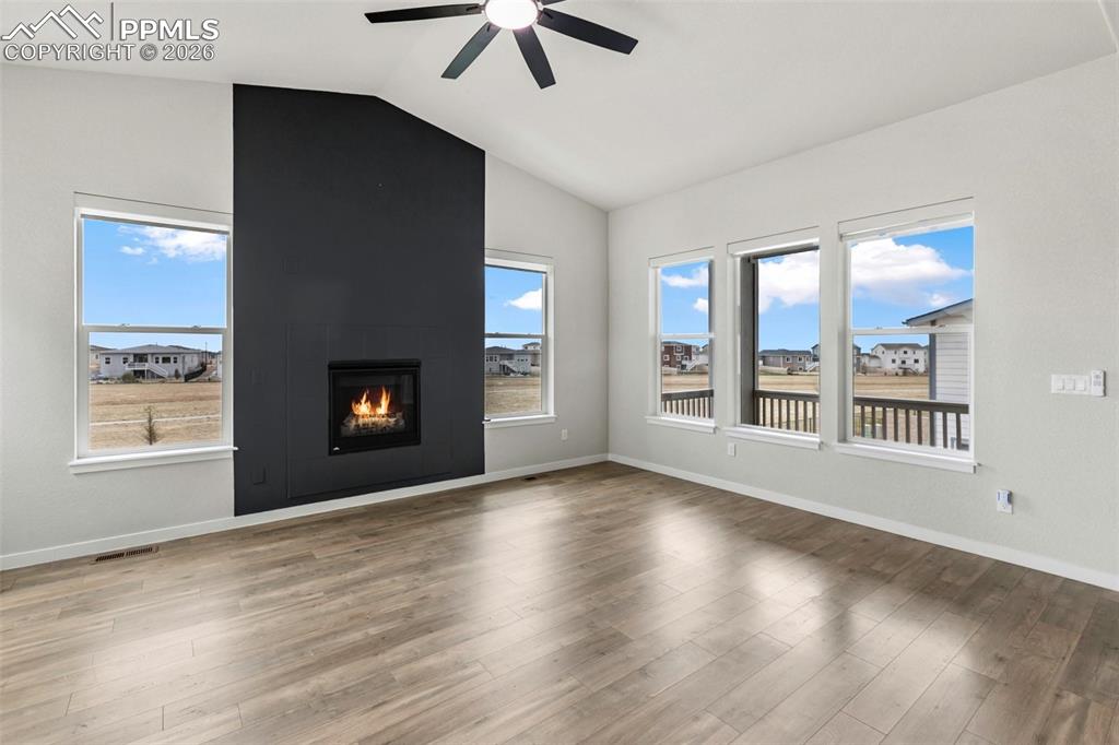 Image 9 of 46: Contemporary living room with sleek fireplace