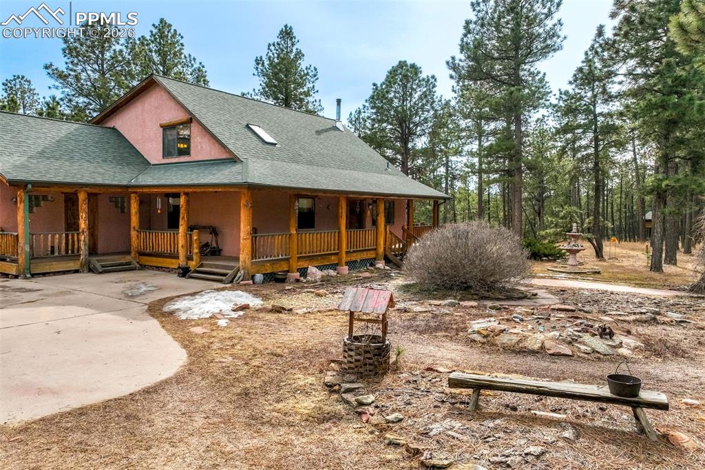 Caption: A covered front porch and spacious back deck offer wonderful spaces to relax and enjoy the surroundi