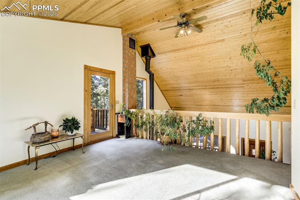 Image 26 of 45: Office, loft, playroom, den walks out to private balcony.