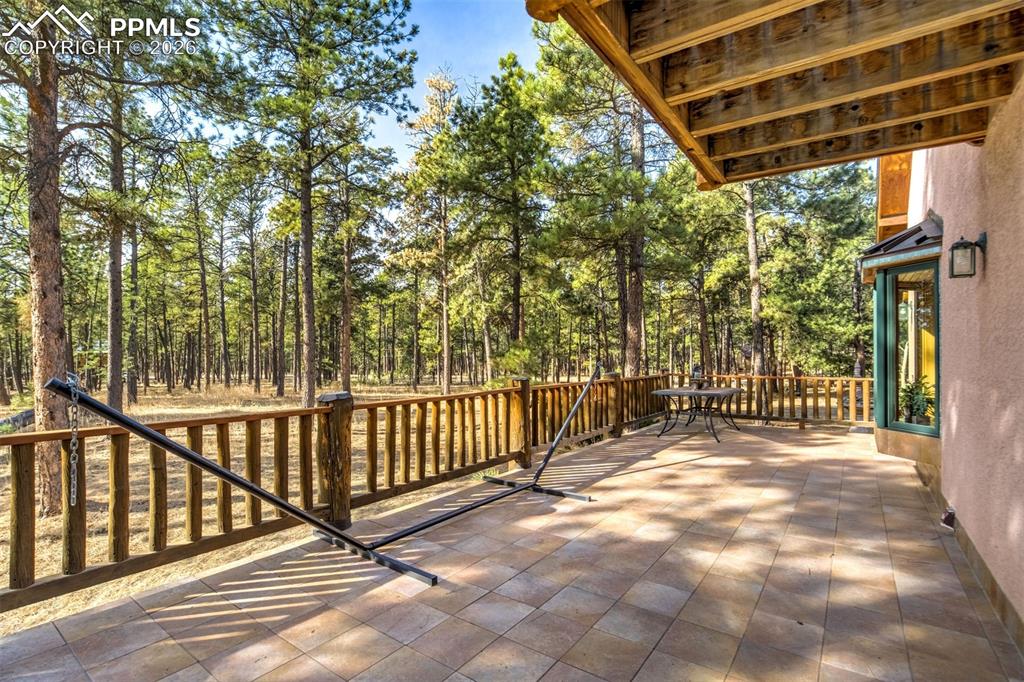 Image 35 of 45: View of patio on the back side of the home.