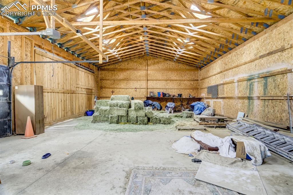 Image 39 of 45: Inside the 1st garage/barn. Will be cleaned out and ready for horse stalls