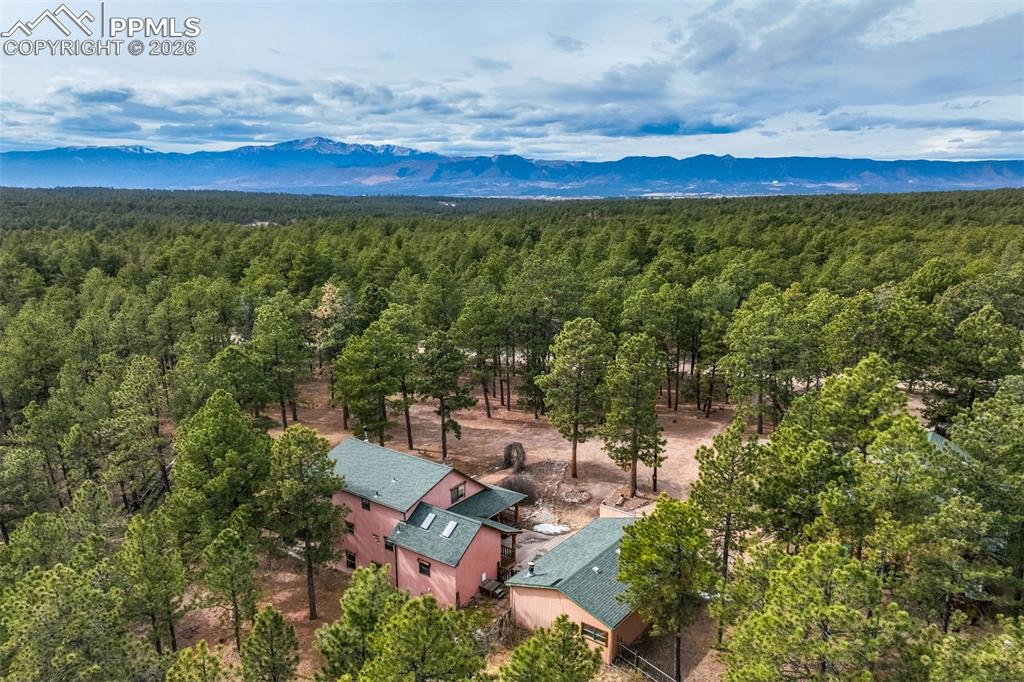 Image 45 of 45: Drone / aerial view of a mountain backdrop