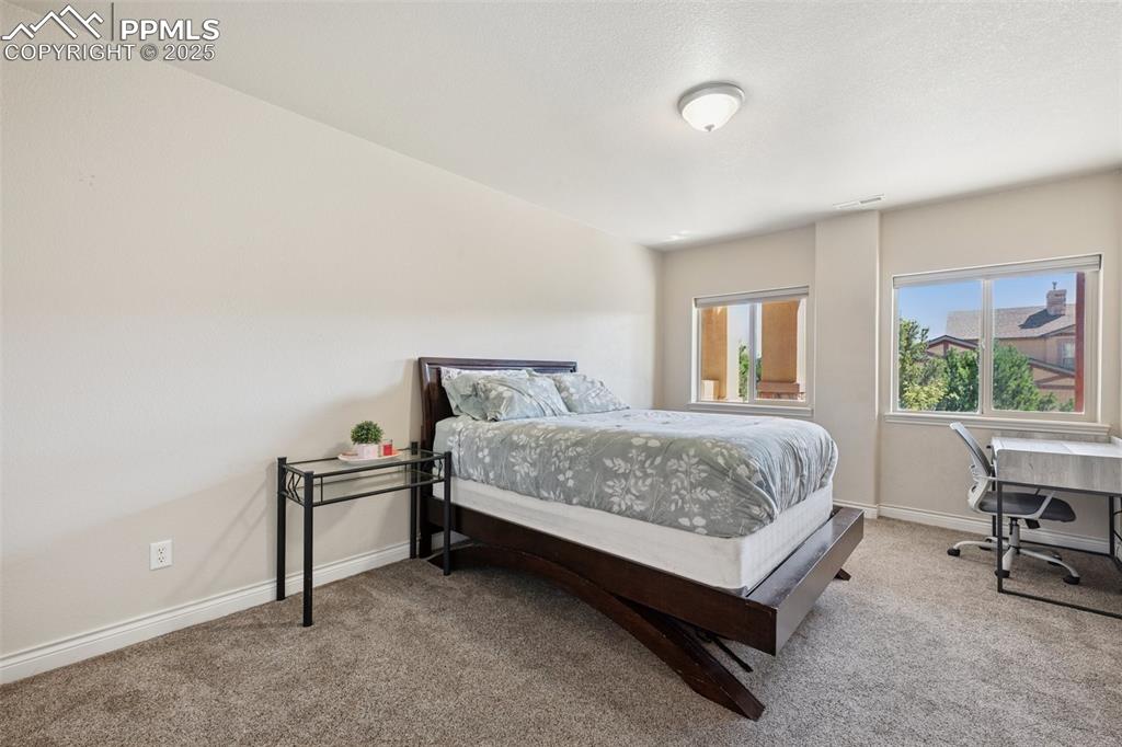 Image 17 of 37: Basement bedroom. 
