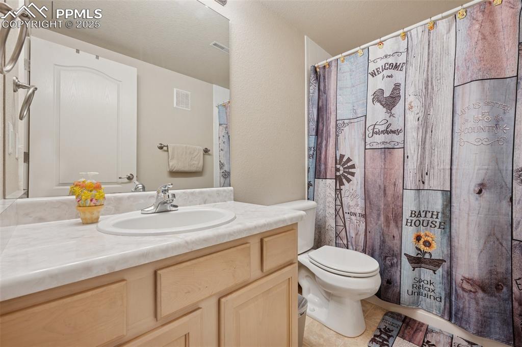 Image 18 of 37: Full basement bathroom. 