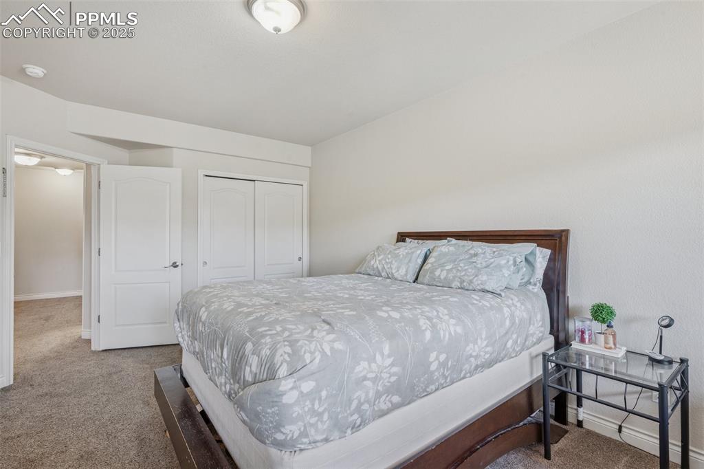 Image 31 of 37: Basement bedroom 