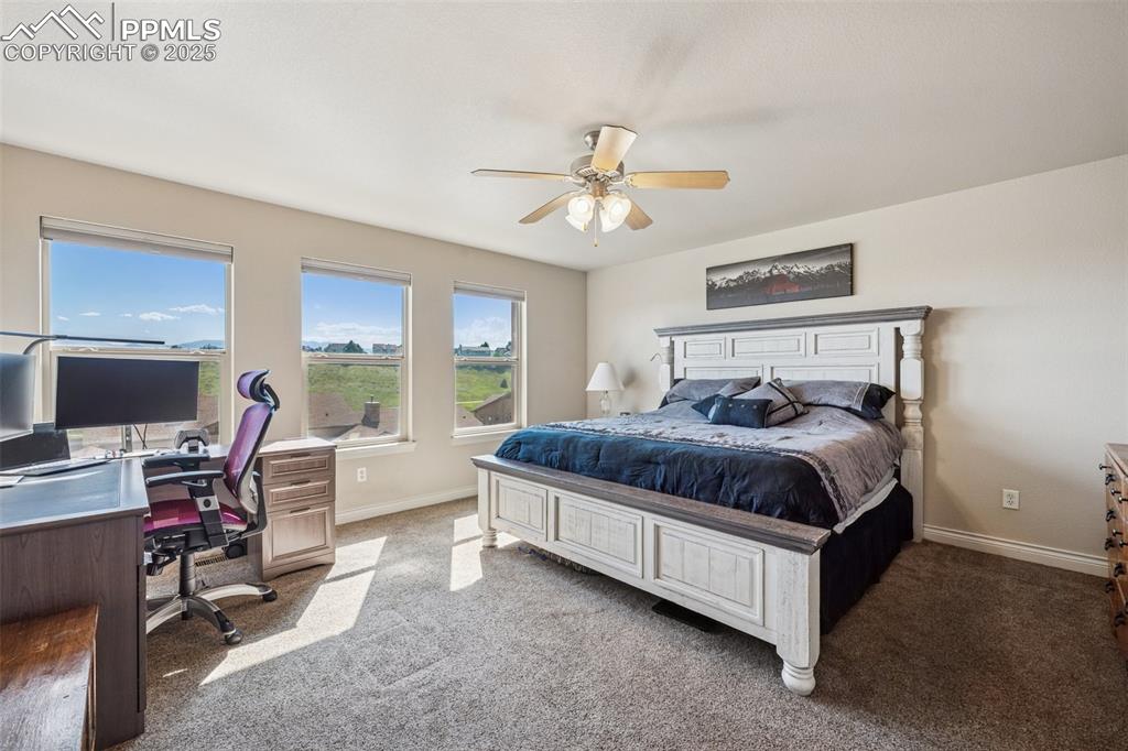 Image 9 of 37: Primary bedroom with attached bathroom. 