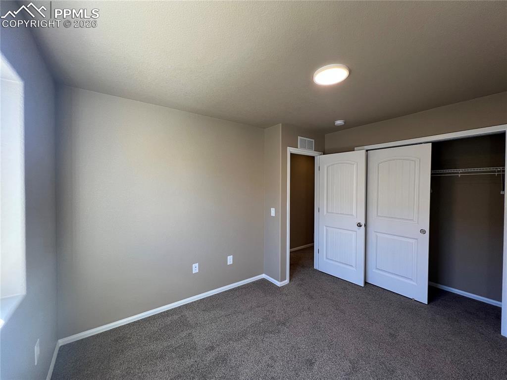 Image 20 of 27: Bedroom