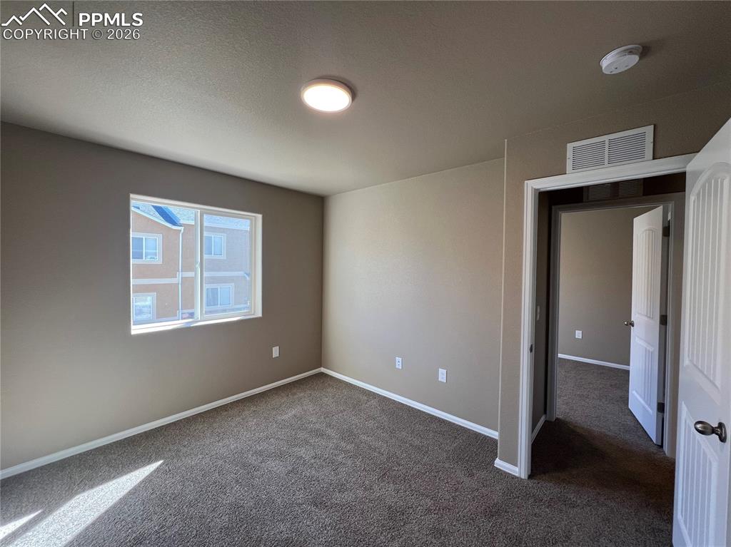 Image 21 of 27: Bedroom