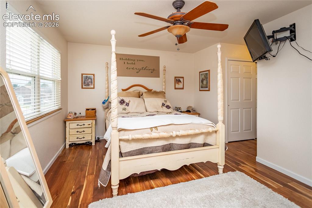Image 26 of 44: The primary suite easily accommodates a king-sized bedroom set while mainta