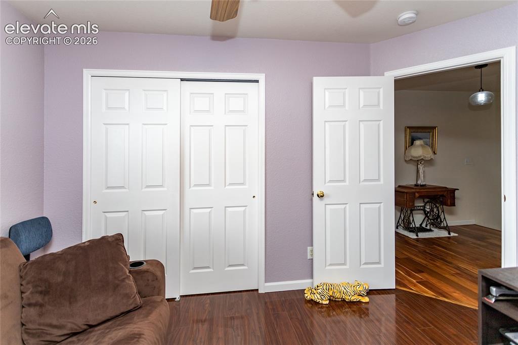 Image 34 of 44: With its own ceiling fan, warm natural light, and clean flooring, the third