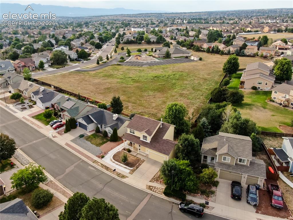 Image 41 of 44: Enjoy a rare sense of peace and privacy with a backyard that backs directly