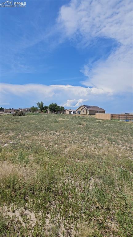 Image 3 of 4: View of yard featuring a view of rural / pastoral area
