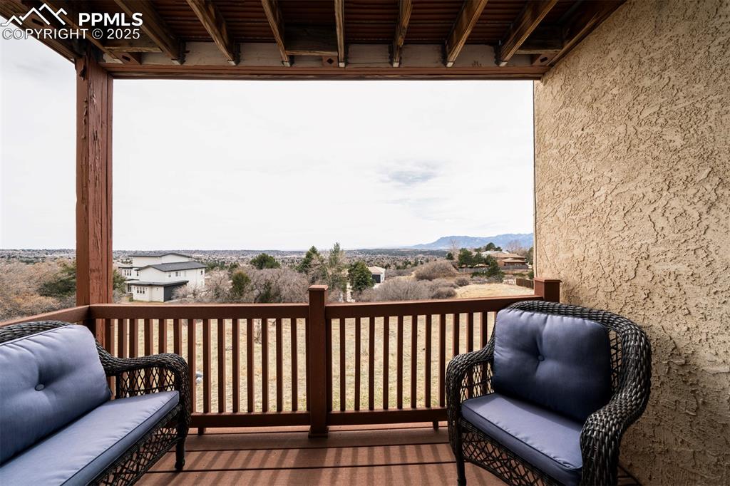 Image 34 of 44: View of deck from main level   walks out from living room 