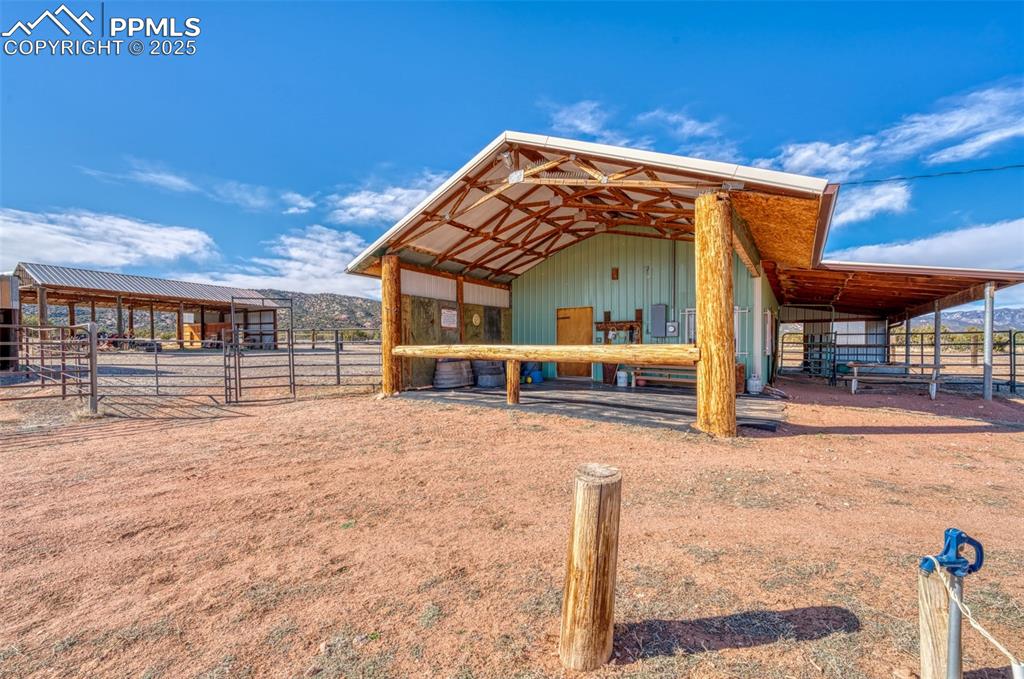 Image 33 of 45: View of outbuilding featuring an exterior structure