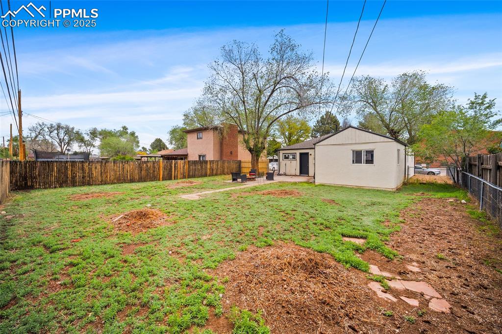 Image 10 of 12: View of yard with a patio area