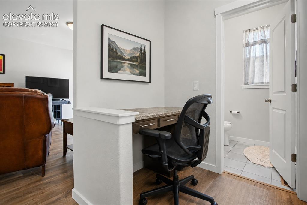 Image 14 of 37: Office and main floor bath