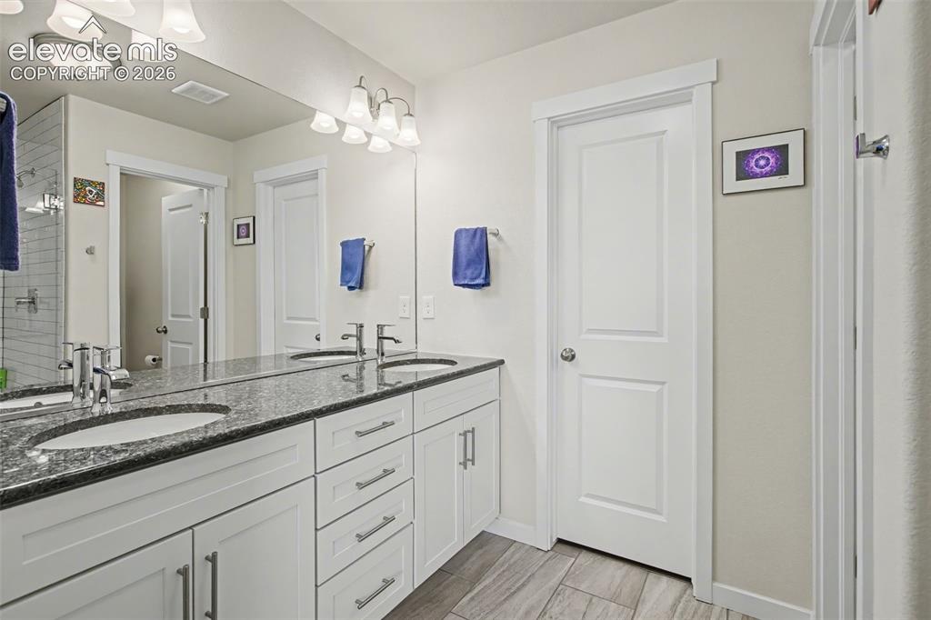 Image 19 of 37: and large walk-in closet