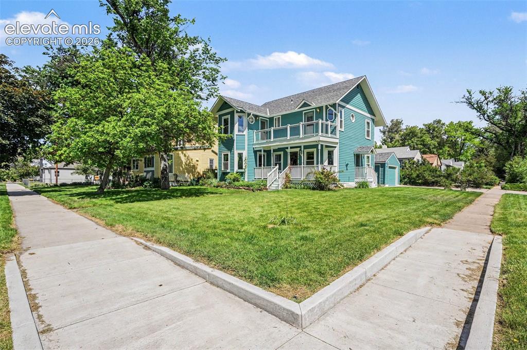 Image 2 of 27: This spacious two-story home with a finished basement features an oversized