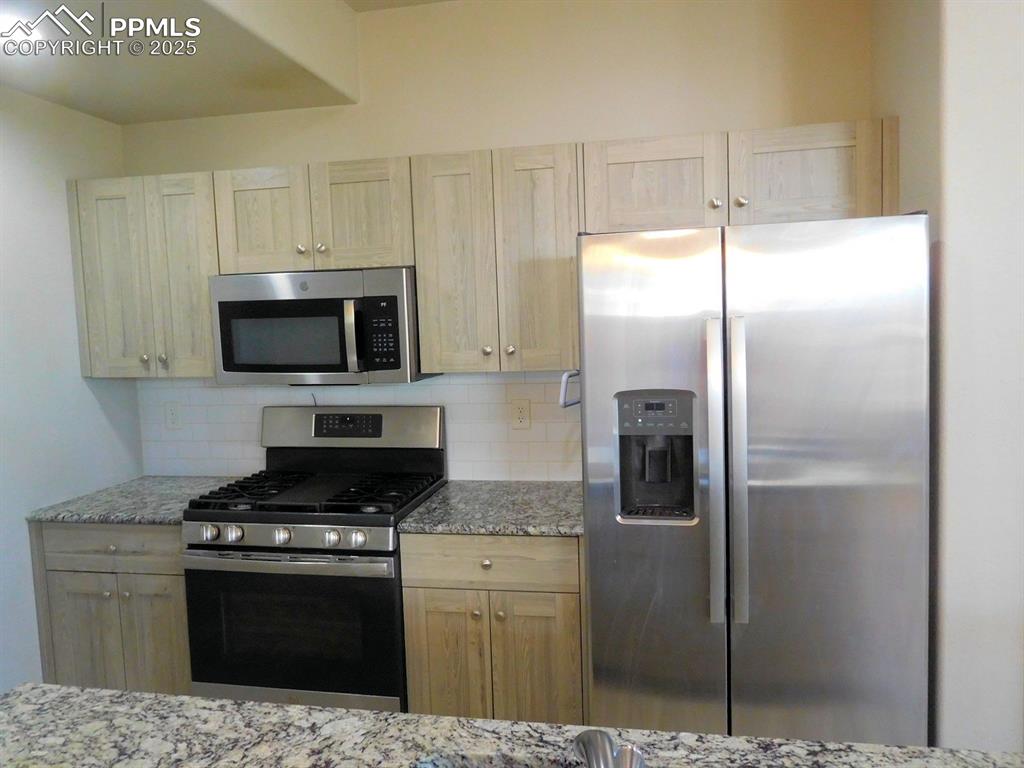 Image 3 of 12: Kitchen