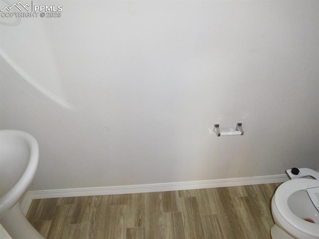 Image 4 of 12: Main level half-bath