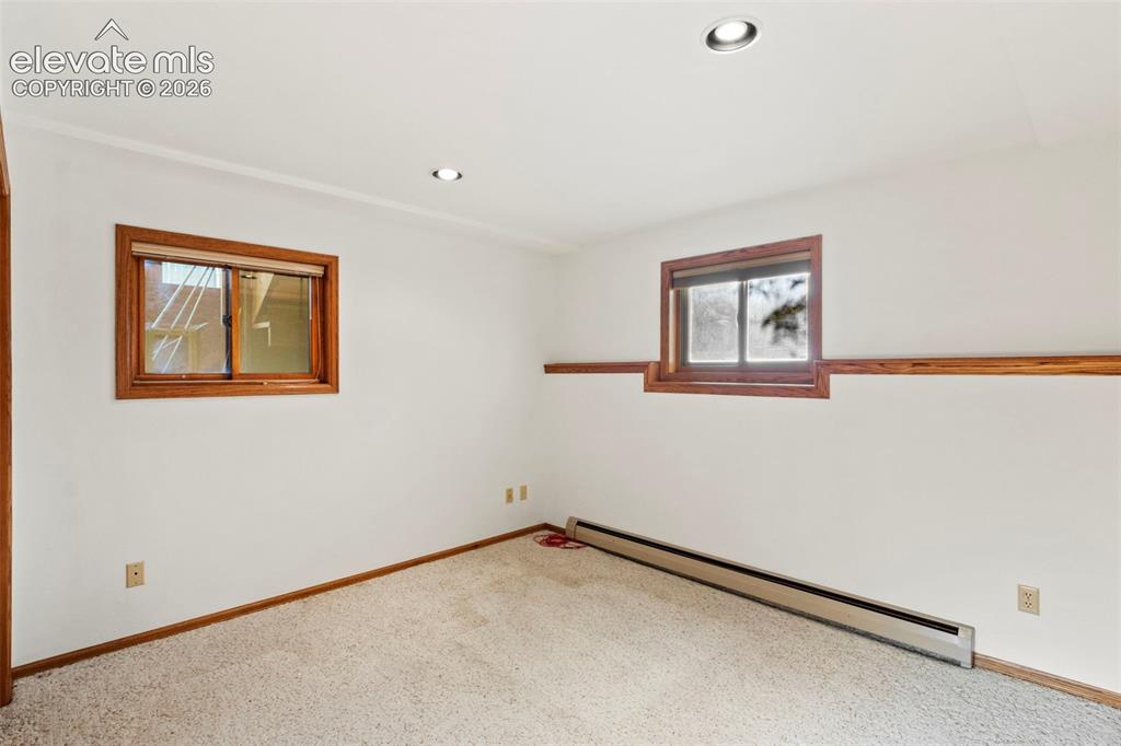 Image 32 of 47: Interior room featuring neutral wall-to-wall carpeting, recessed ceiling li