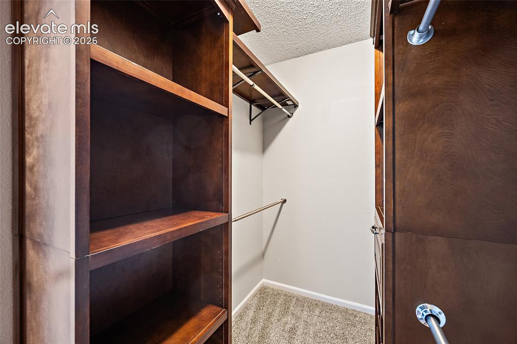Image 17 of 49: primary closet