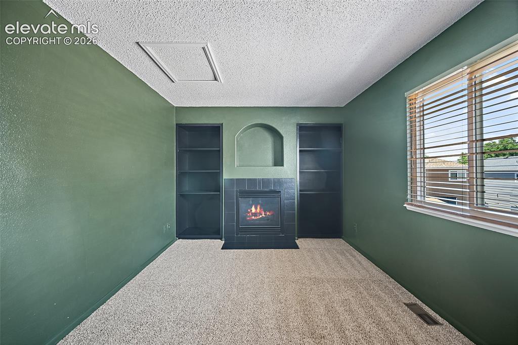 Image 20 of 49: primary suit bonus room 