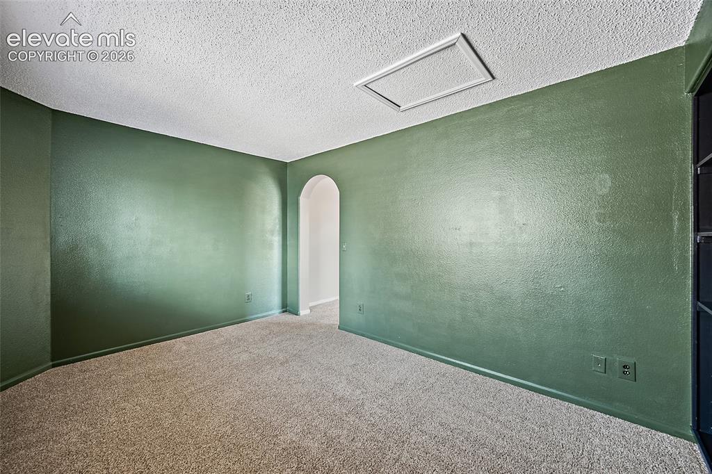 Image 21 of 49: primary suit bonus room 