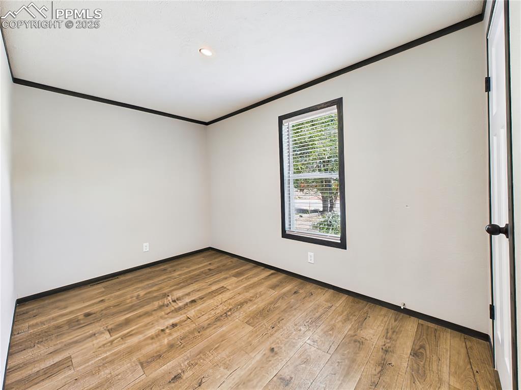 Image 31 of 39: Bedroom 3 (Alternate View) – Offers a bright atmosphere and an easy-to-furn
