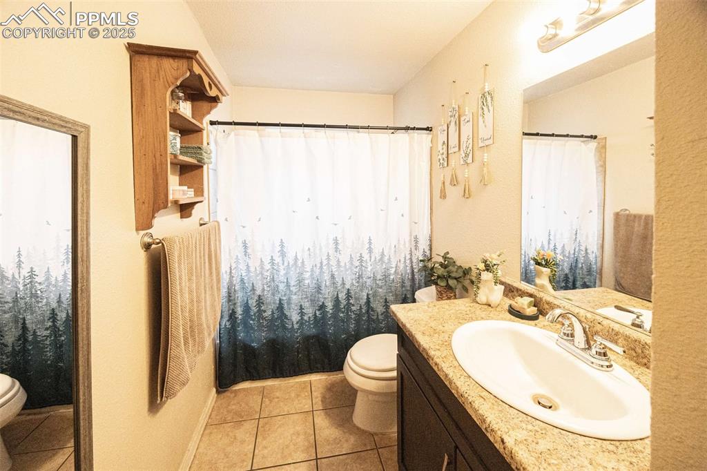 Image 8 of 21: Upstairs full bathroom                                              