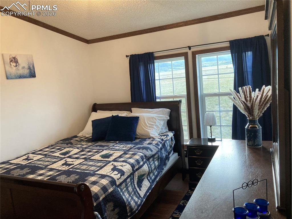 Image 16 of 38: Bedroom