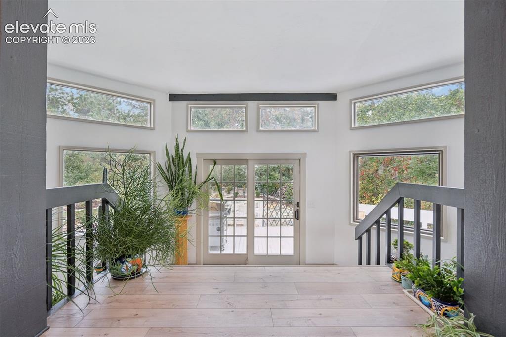 Image 14 of 50: atrium and walk out to backyard from the kitchen