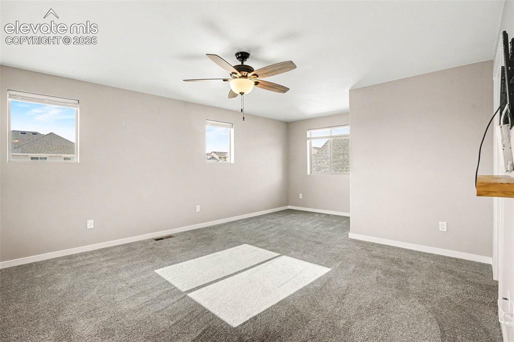 Image 14 of 27: Gourmet kitchen featuring wood-finish flooring, ample cabinetry, stainless 