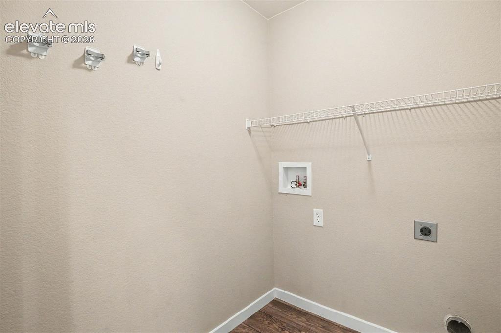 Image 19 of 27: Double vanity with granite countertop, undermount sinks, and brushed nickel