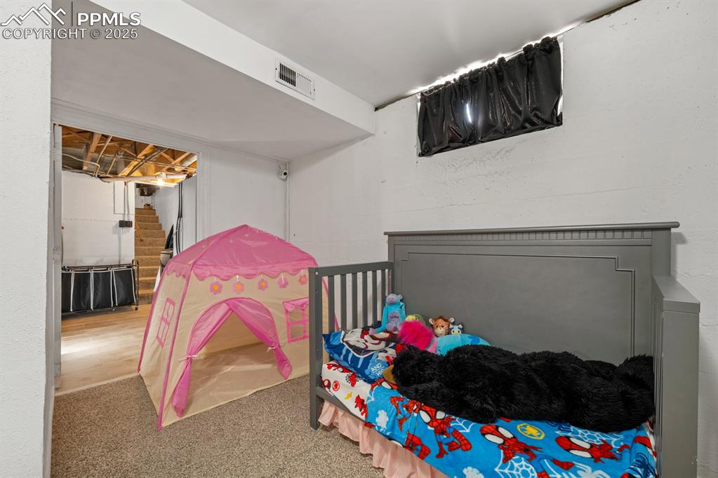 Image 24 of 34: Bedroom