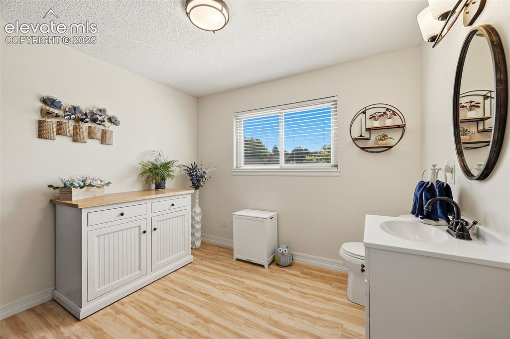Image 21 of 41: Laundry Room shares this space