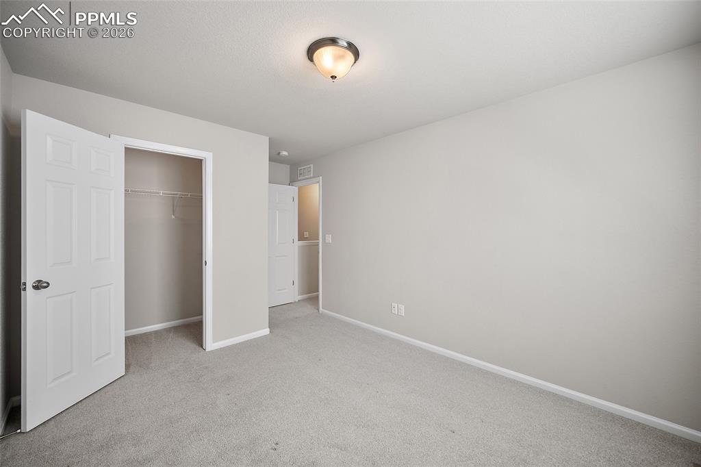 Image 18 of 33: Bedroom