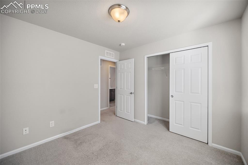 Image 20 of 33: Bedroom