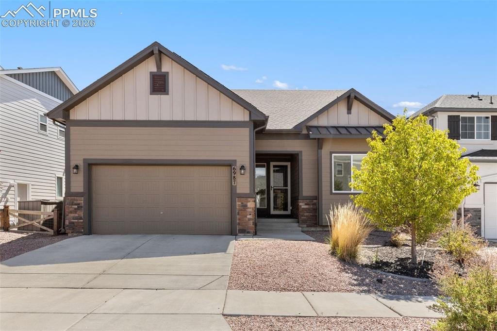 Image 6 of 44: Contemporary ranch-style residence featuring a two-car garage