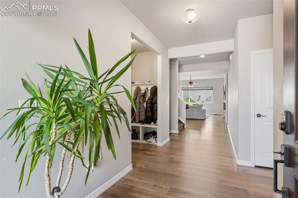 Image 8 of 44: Entryway featuring wood-finish flooring, recessed lighting, and a built-in 