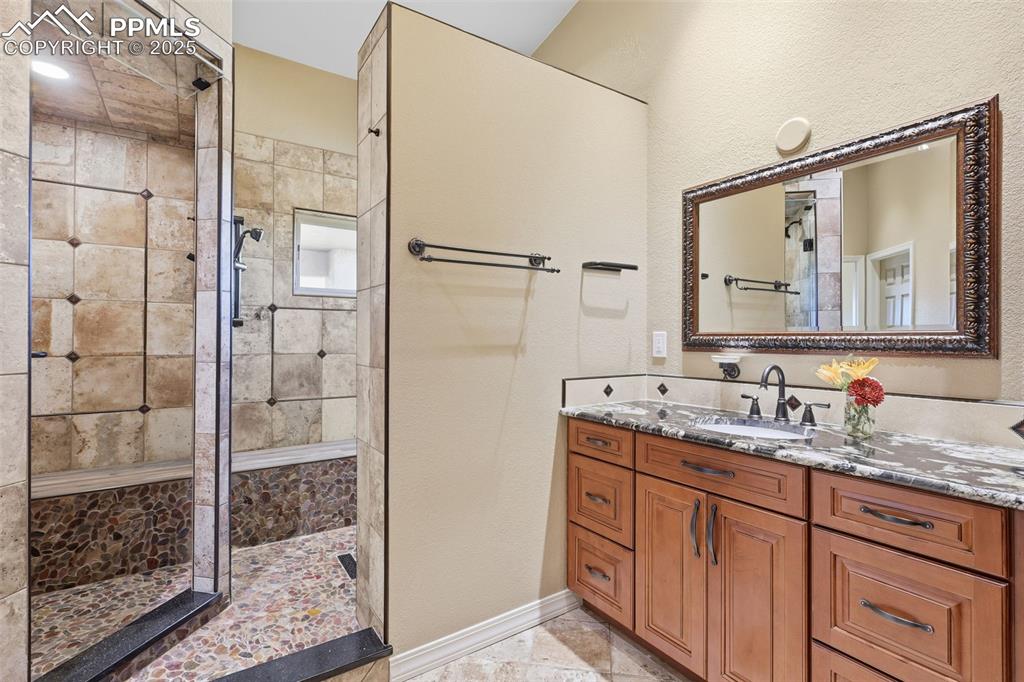 Image 16 of 50: Dual Showers!  Smart, Remote Controlled Steam Shower on the Left!