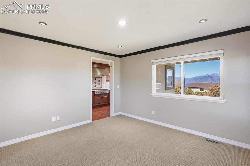 Image 24 of 50: Formal Dining Room Great for Entertaining and Soaking in the Views!